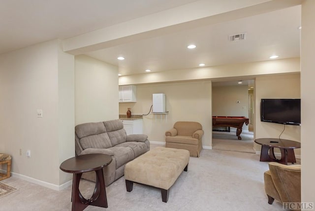 living room featuring light colored carpet and pool table