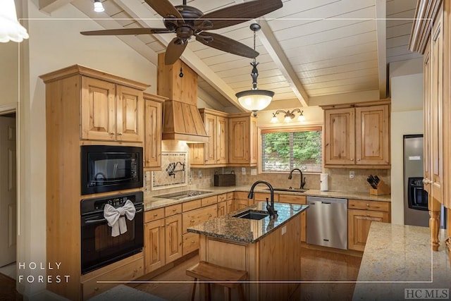 kitchen featuring sink, stone counters, vaulted ceiling with beams, black appliances, and a center island with sink