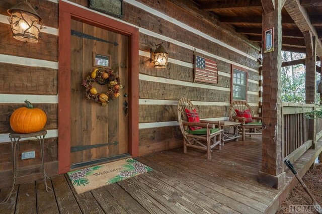 property entrance with a porch