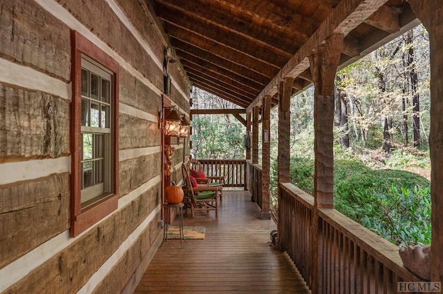 wooden terrace featuring a porch