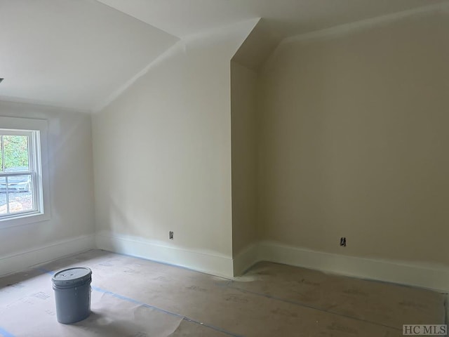 bonus room with vaulted ceiling