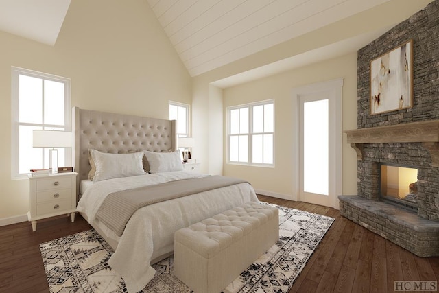 bedroom featuring a fireplace, dark hardwood / wood-style flooring, and high vaulted ceiling