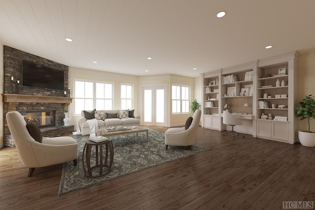 living room with a stone fireplace and dark hardwood / wood-style flooring