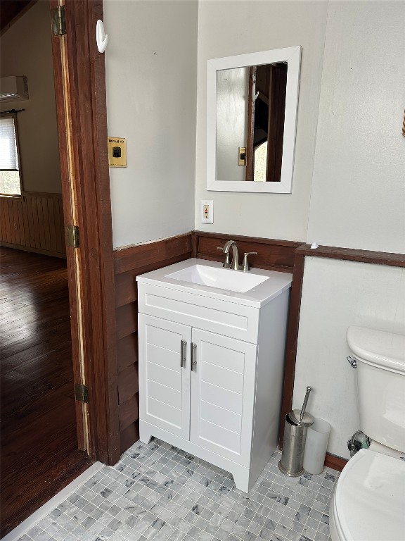 181 Hiwassee Rd, Lake Toxaway, NC 28747 - bathroom featuring a wainscoted wall and vanity