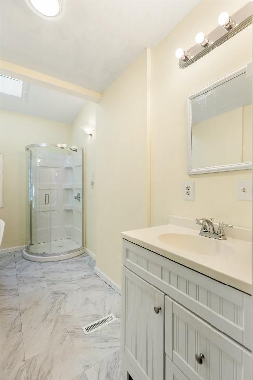 181 Hiwassee Rd, Lake Toxaway, NC 28747 - full bath featuring marble finish flooring, vanity, and a shower stall