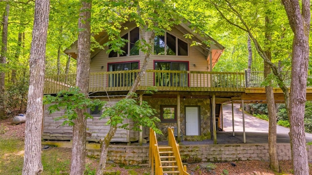 181 Hiwassee Rd, Lake Toxaway, NC 28747 - back of property featuring stairway and a wooden deck