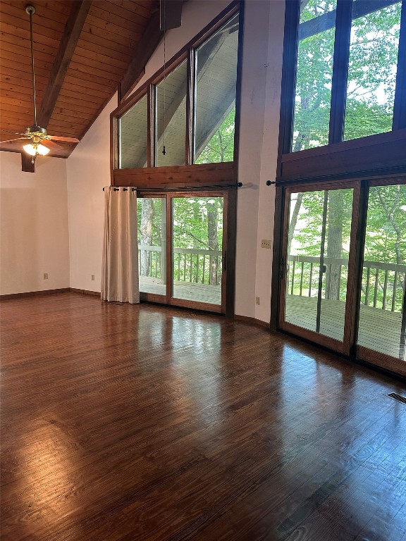 181 Hiwassee Rd, Lake Toxaway, NC 28747 - empty room with high vaulted ceiling, a ceiling fan, wood finished floors, and a wood ceiling with exposed beams