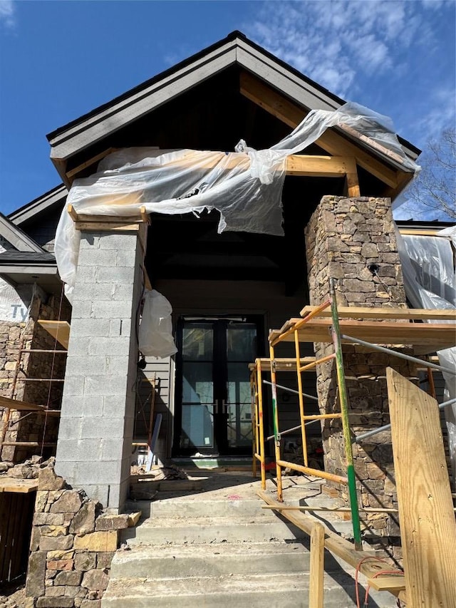doorway to property featuring french doors