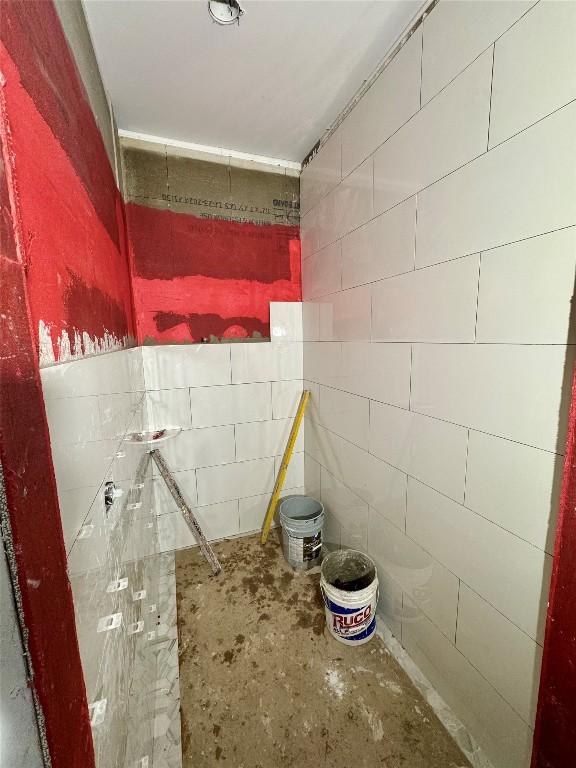 2385 Magnolia Dr, Highlands, NC 28741 - bathroom with unfinished concrete floors