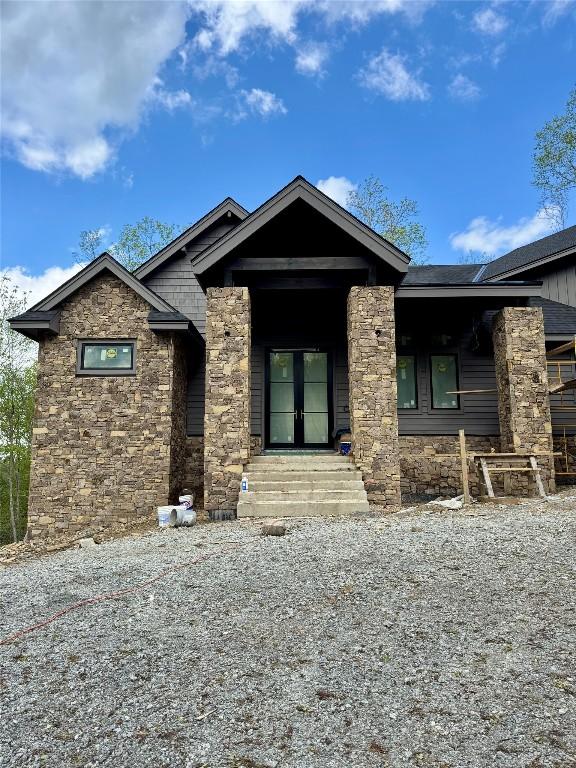 view of front facade featuring stone siding