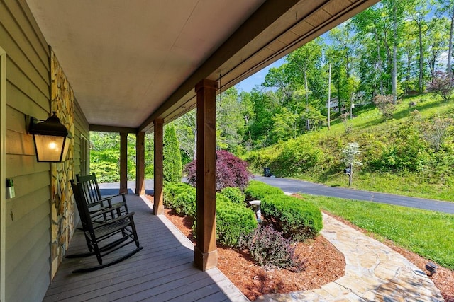 wooden deck featuring covered porch