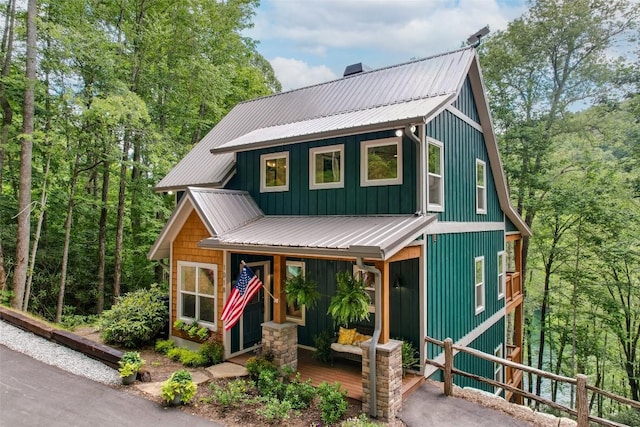 1018N Norton Rd, Cashiers, NC 28717 - view of front of home with a metal roof, a porch, and board and batten siding