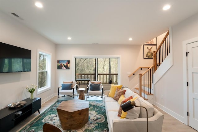 1018N Norton Rd, Cashiers, NC 28717 - living room featuring visible vents, recessed lighting, light wood-style floors, and stairway