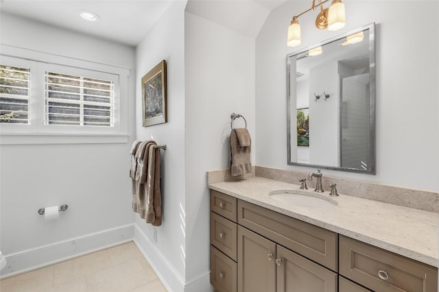 bathroom with vanity and tile patterned flooring