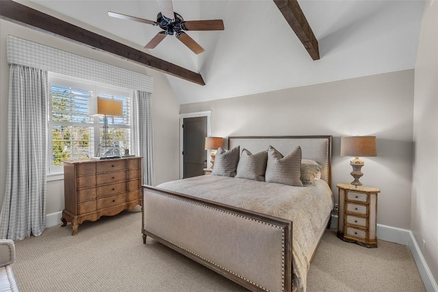 carpeted bedroom with lofted ceiling with beams and ceiling fan