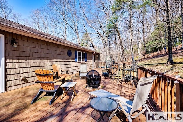 deck featuring a fire pit