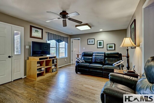 living room with recessed lighting, ceiling fan, baseboards, and wood finished floors