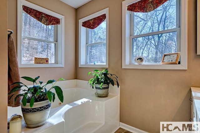 bathroom featuring a garden tub