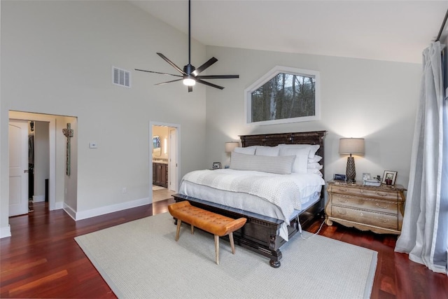 bedroom with visible vents, a ceiling fan, wood finished floors, high vaulted ceiling, and baseboards
