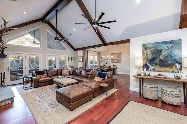 living room featuring high vaulted ceiling, wood finished floors, visible vents, french doors, and beamed ceiling