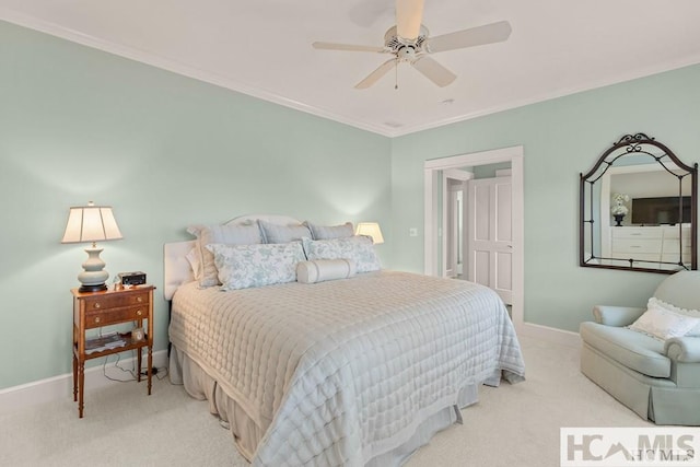 bedroom with light carpet, baseboards, ornamental molding, and ceiling fan