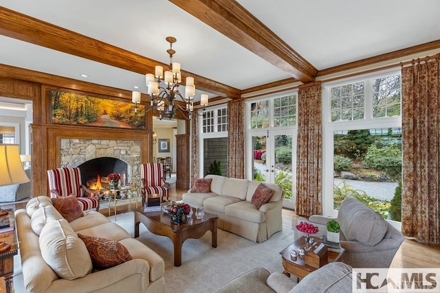 living room featuring beam ceiling, a chandelier, a stone fireplace, and ornamental molding
