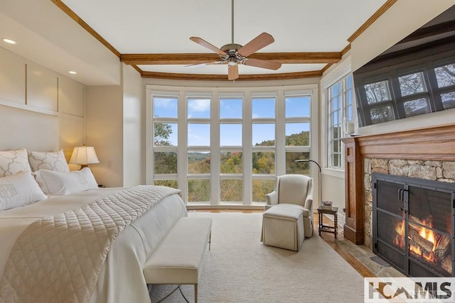 bedroom with a fireplace, multiple windows, beamed ceiling, crown molding, and recessed lighting