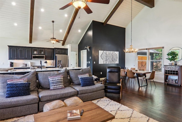 665 Trays Island Rd, Sapphire, NC 28774 - living area with a ceiling fan, high vaulted ceiling, dark wood-type flooring, beam ceiling, and a chandelier