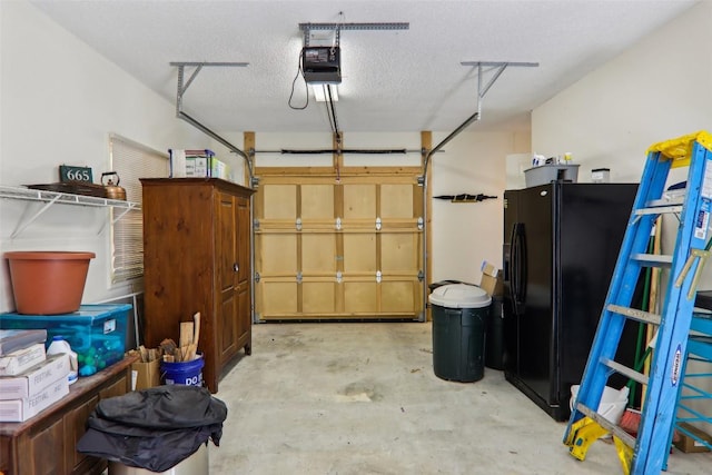 665 Trays Island Rd, Sapphire, NC 28774 - garage with black fridge with ice dispenser and a garage door opener