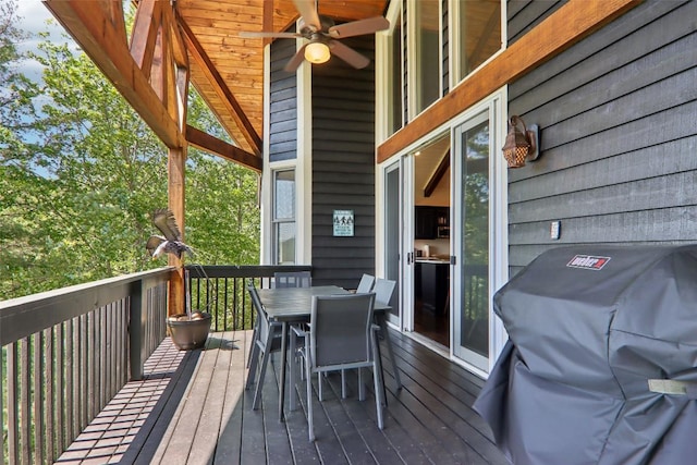 665 Trays Island Rd, Sapphire, NC 28774 - wooden terrace featuring outdoor dining space, a ceiling fan, and area for grilling