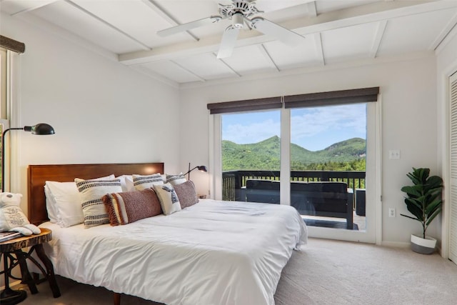 665 Trays Island Rd, Sapphire, NC 28774 - bedroom featuring access to exterior, beamed ceiling, carpet, a ceiling fan, and baseboards