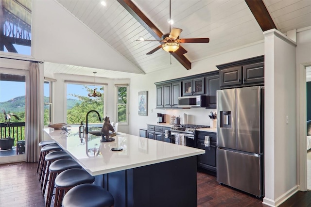 665 Trays Island Rd, Sapphire, NC 28774 - kitchen with stainless steel appliances, wood ceiling, dark wood-style floors, a sink, and light countertops