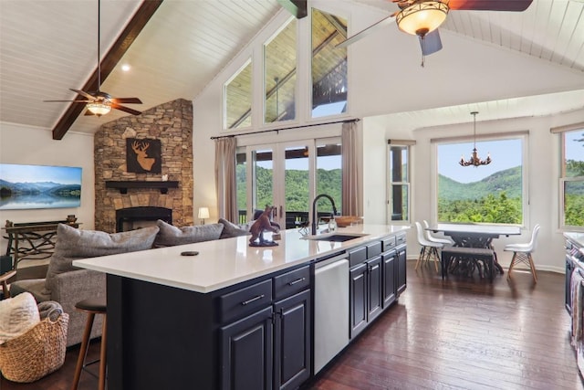 665 Trays Island Rd, Sapphire, NC 28774 - kitchen featuring a sink, dishwasher, ceiling fan, open floor plan, and a fireplace