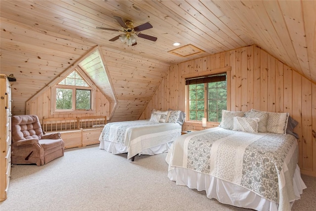 267 Hero Ln, Glenville, NC 28736 - bedroom featuring wooden walls, lofted ceiling, wooden ceiling, carpet, and a ceiling fan