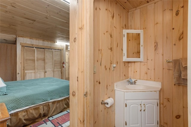 267 Hero Ln, Glenville, NC 28736 - bathroom with vanity, wooden walls, and wooden ceiling
