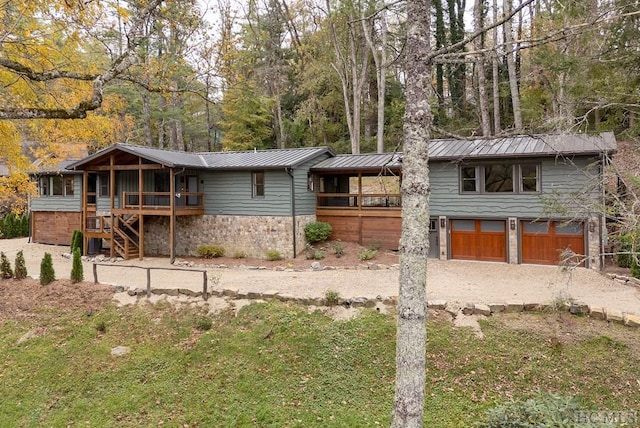 view of front of property with a garage