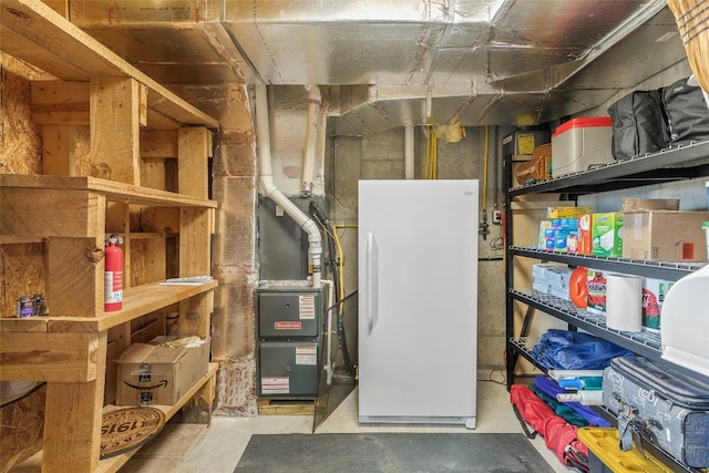 storage room featuring heating unit