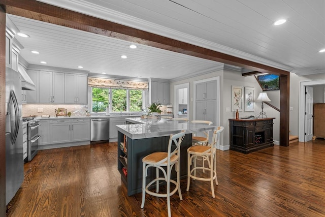 108 W View Way, Highlands, NC 28741 - kitchen with appliances with stainless steel finishes, dark wood-type flooring, recessed lighting, tasteful backsplash, and a breakfast bar