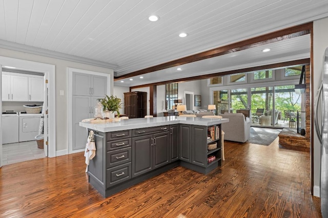 108 W View Way, Highlands, NC 28741 - kitchen featuring gray cabinets, open shelves, open floor plan, washer and clothes dryer, and a center island
