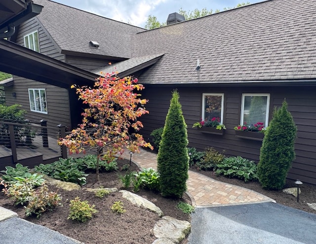 108 W View Way, Highlands, NC 28741 - view of property exterior with roof with shingles, a chimney, and a deck