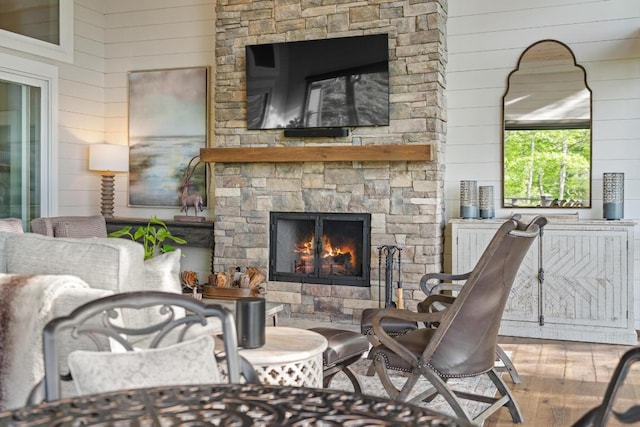 108 W View Way, Highlands, NC 28741 - living room featuring wood finished floors, wood walls, and a fireplace