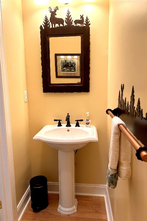 135 Whisper Lake Dr, Sapphire, NC 28774 - bathroom with wood finished floors and baseboards