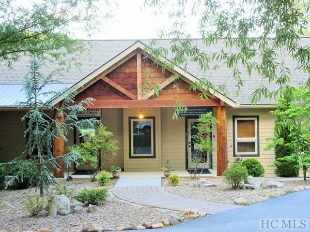 135 Whisper Lake Dr, Sapphire, NC 28774 - view of front of house featuring covered porch