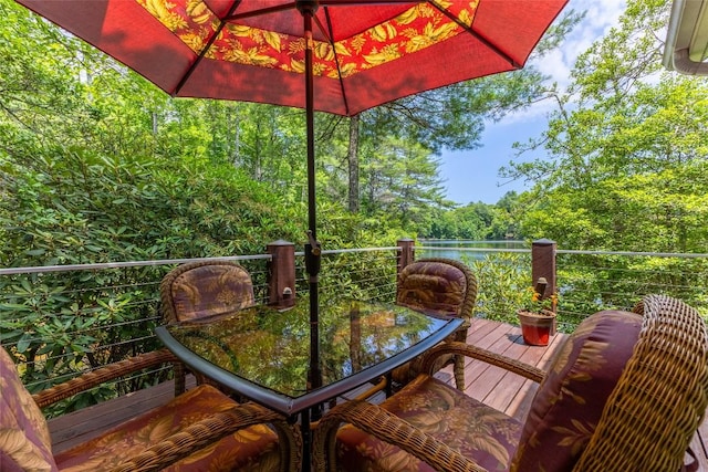 135 Whisper Lake Dr, Sapphire, NC 28774 - wooden deck with outdoor dining space