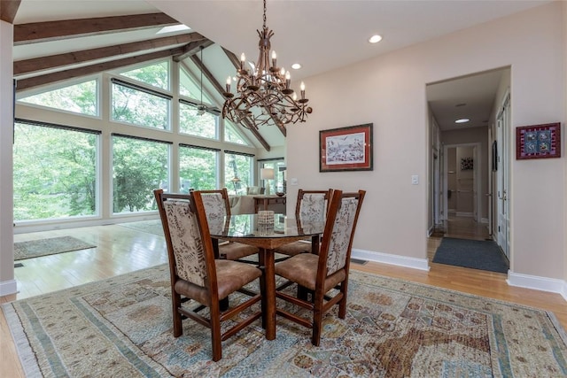 135 Whisper Lake Dr, Sapphire, NC 28774 - dining space featuring light wood finished floors, beamed ceiling, recessed lighting, a chandelier, and high vaulted ceiling