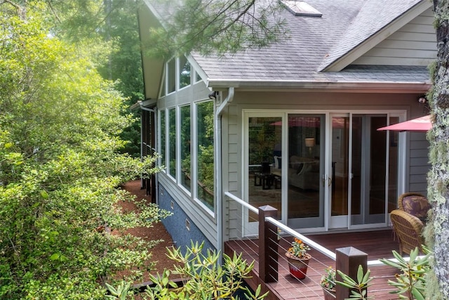 135 Whisper Lake Dr, Sapphire, NC 28774 - view of property exterior with roof with shingles and a deck