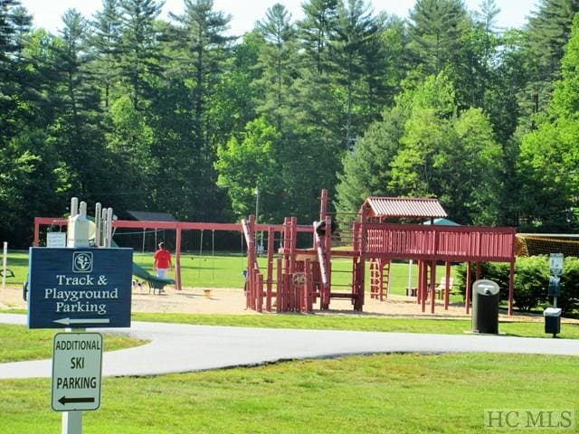 135 Whisper Lake Dr, Sapphire, NC 28774 - community playground with a yard
