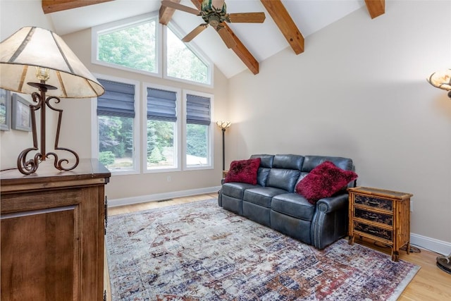 135 Whisper Lake Dr, Sapphire, NC 28774 - living room with wood finished floors, ceiling fan, beam ceiling, and high vaulted ceiling