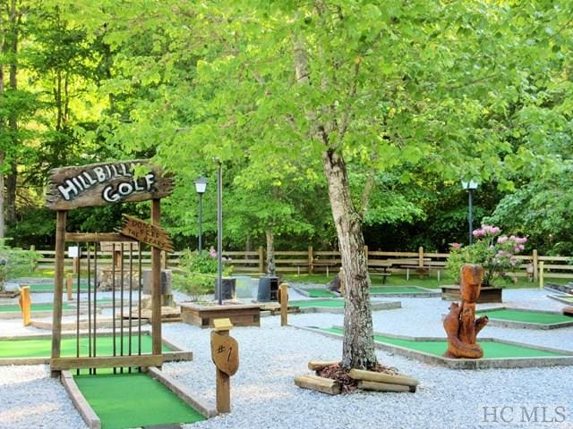 135 Whisper Lake Dr, Sapphire, NC 28774 - view of home's community with a putting area