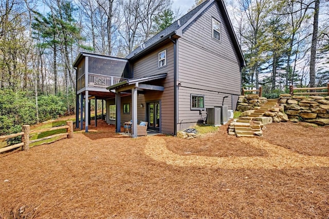 49 Lakeside Fls, Cullowhee, NC 28723 - view of home's exterior with central AC unit, stairway, a wooden deck, and a sunroom